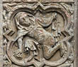 Panel 07:03 - Cowled man with dog's head